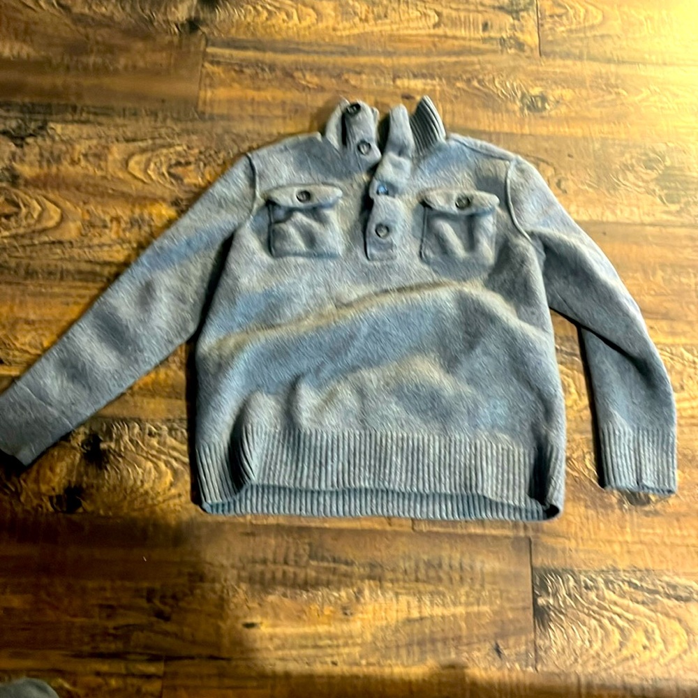 Thick & heavy extra fine Merino Wool sweater.  XL, fits like M but is stretchy.